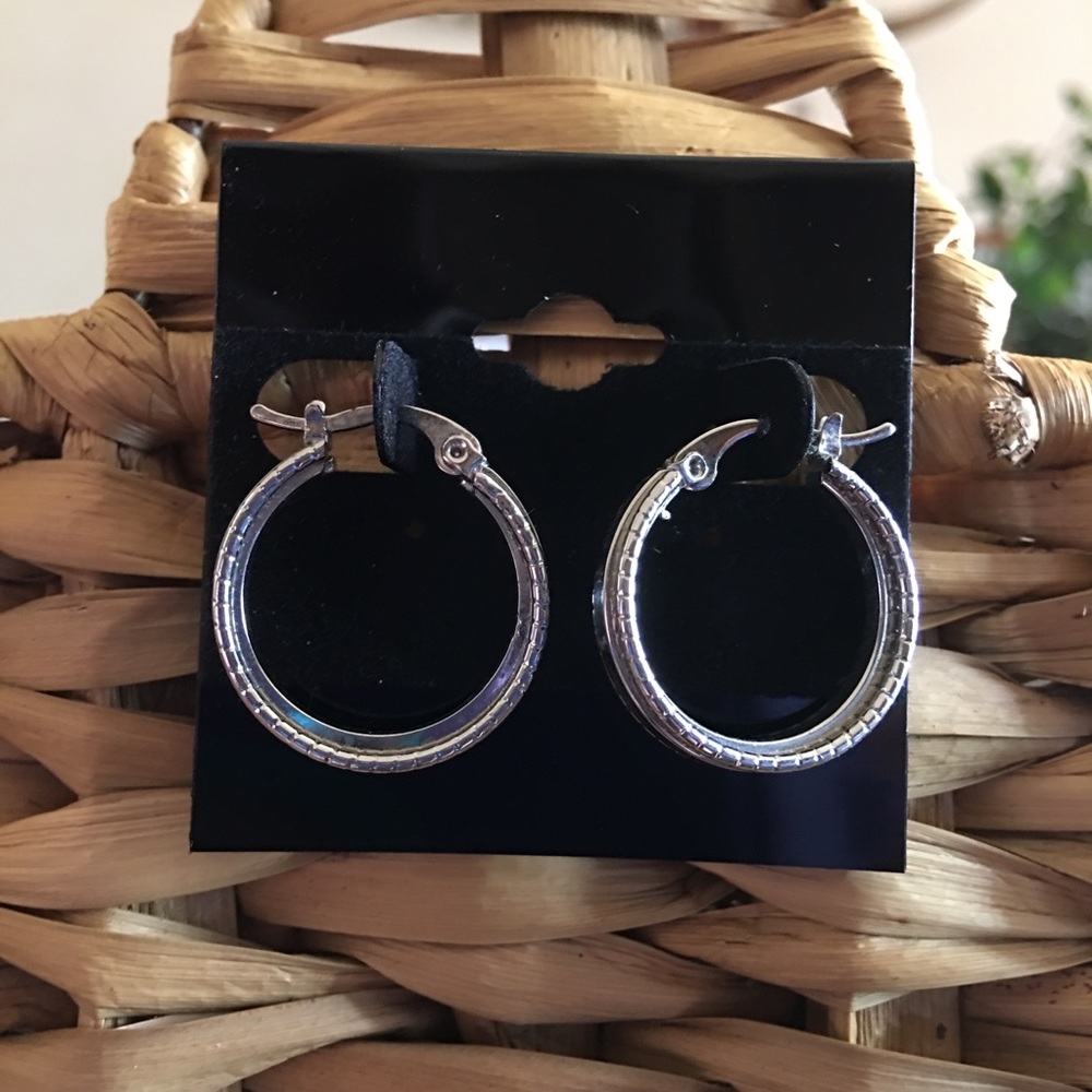 Shiny silver tone latch back hoop earrings